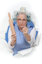 Angry old woman with a rolling pin